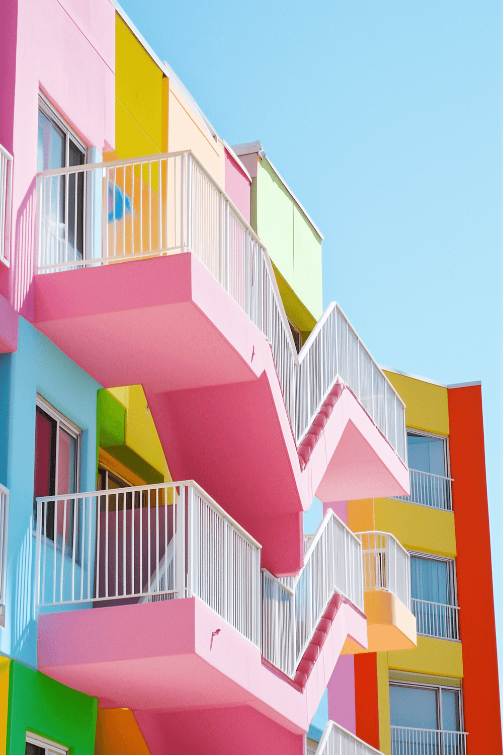 Apartment building with pastel balconies